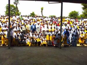 Bishop Kibira with the missionary childhood short after mass at Our lady of assumption Kasese Cathedral