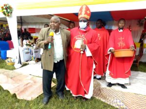 Bishop Kibira with Chief Tito Mukonzo Muhanuka the one who offered Nyakahya Parish Land to the church