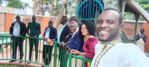 AMECEA correspondents Infront of the Marian Grotto at Catholic Martyrs Shrine Namugongo