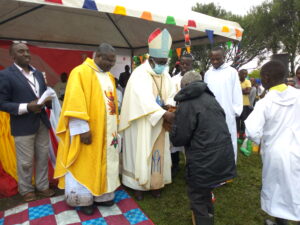 BISHOP KIBIRA AND FR. PETER BASALIZA AT KANYAGWENJE