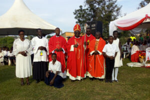 BISHOP KIBIRA WITH PRIESTS OF HIMA PARISH AND FR. SYATHETHA