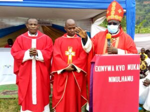 Bishop Kibira with Fr Sumbuku the former parish priest in the middle and Fr Cosmas Baluku the Parish Priest Kakone