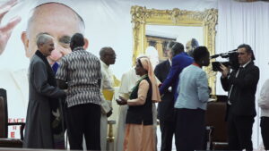 Pope Francis greetings a section of participants during the meeting with IDPs