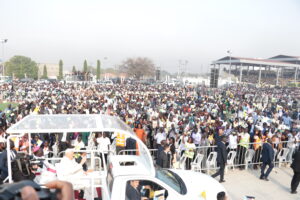 Pope Francis on his automobile as he received greetings from people attending closing mass at John Garang Mausoleum