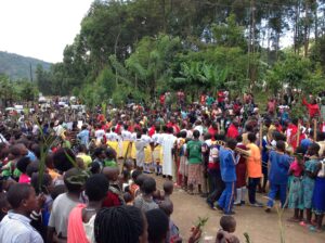 BISHOP KIBIRA DURING THE PROCESSION WITH PALM