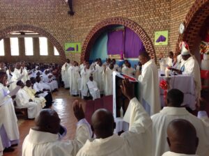 BISHOP KIBIRA KIBIRA WITH PRIEST AT THE CATHEDRAL