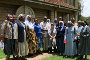 JPIC's pausing with Archbishop Anyolo