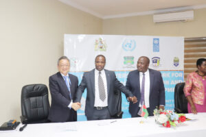 Mr. Nkhoma Signing the MoU