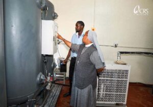 Sr. Mary Agnes Nkatha, CEO for St. Theresa Mission Hospital inspecting the Oxygen plant. Credit; CRS