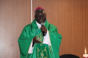 Archbishop Philip Anyolo during opening Mass