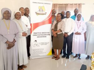 Members of Child protection commission Lira diocese in group photo together with facilitators from the National Secretariat at the climax of the training in Lira