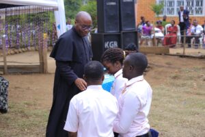 FR AUGUSTINE BLESSING SOME OF THE STAFF