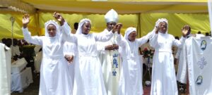 BISHOP KIBIRA WITH THE NEW VOWED RELIGIOUS SISTERS