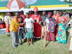 BISHOP KIBIRA WITH THE PWDs AT MUSASA