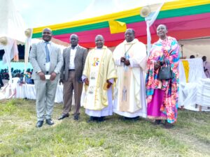 BISHOP KIBIRA, FR.PETER BASALIZA, PAPA KALAMBAYI, MR. JOHN AND HIS WIFE