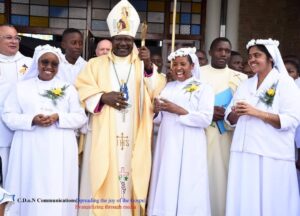 Bishop John Oballa of Ngong Diocese Flanked by the Newly Consecrated Perpetual Virgins in the World