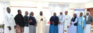 ACWECA staff with the main celebrant, Fr. Oswald Mulenga (Fifth from left)