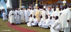Archbishop Emeritus John Baptist Odama flanked by other Bishops and the priests in group photo at the climax of Peace and Prayer Week in Gulu city