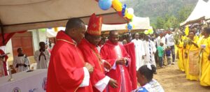 BISHOP KIBIRA WITH FR MORIS AND LOTI AT KIJURA RCC