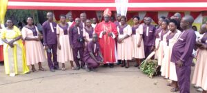 BISHOP KIBIRA WITH TEACHERS OF KALIKYIKALIKYI P.S AT KASISYO RCC