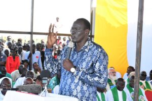 Photo of Governor of Unity State addressing the faithful during the Inauguration and installation of Pioneer Bishop of Bentiu Diocese - Copy