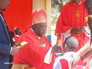 Archbishop Tambala confirming Christians