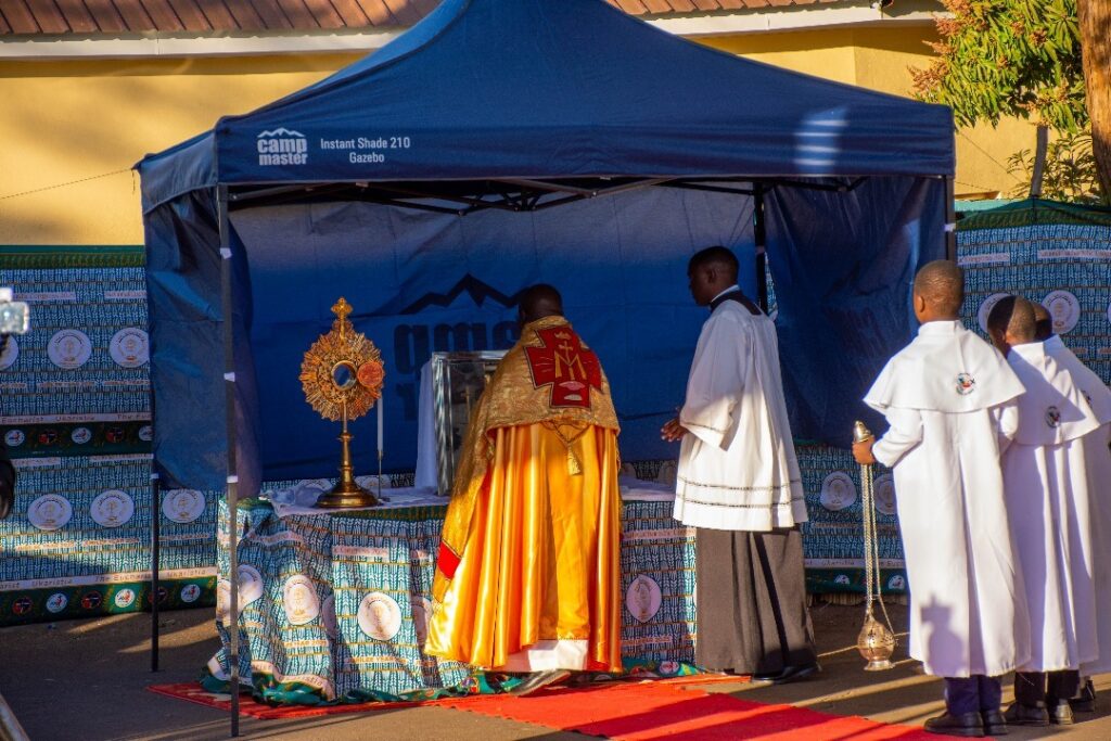 Exposed Blessed Sacrament being taken back after Adoration