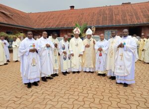 BISHOP SIKULI WITH CLERGY FROM THE DIOCESE OF KASESE (1)