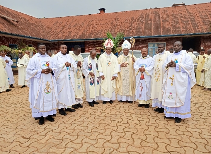 BISHOP SIKULI WITH CLERGY FROM THE DIOCESE OF KASESE (1)