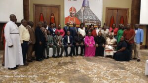 BISHOP KIBIRA WITH THE MEMBER OF THE COMMITTEE