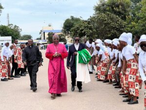 ARCHBISHOP WITH STUDENTS