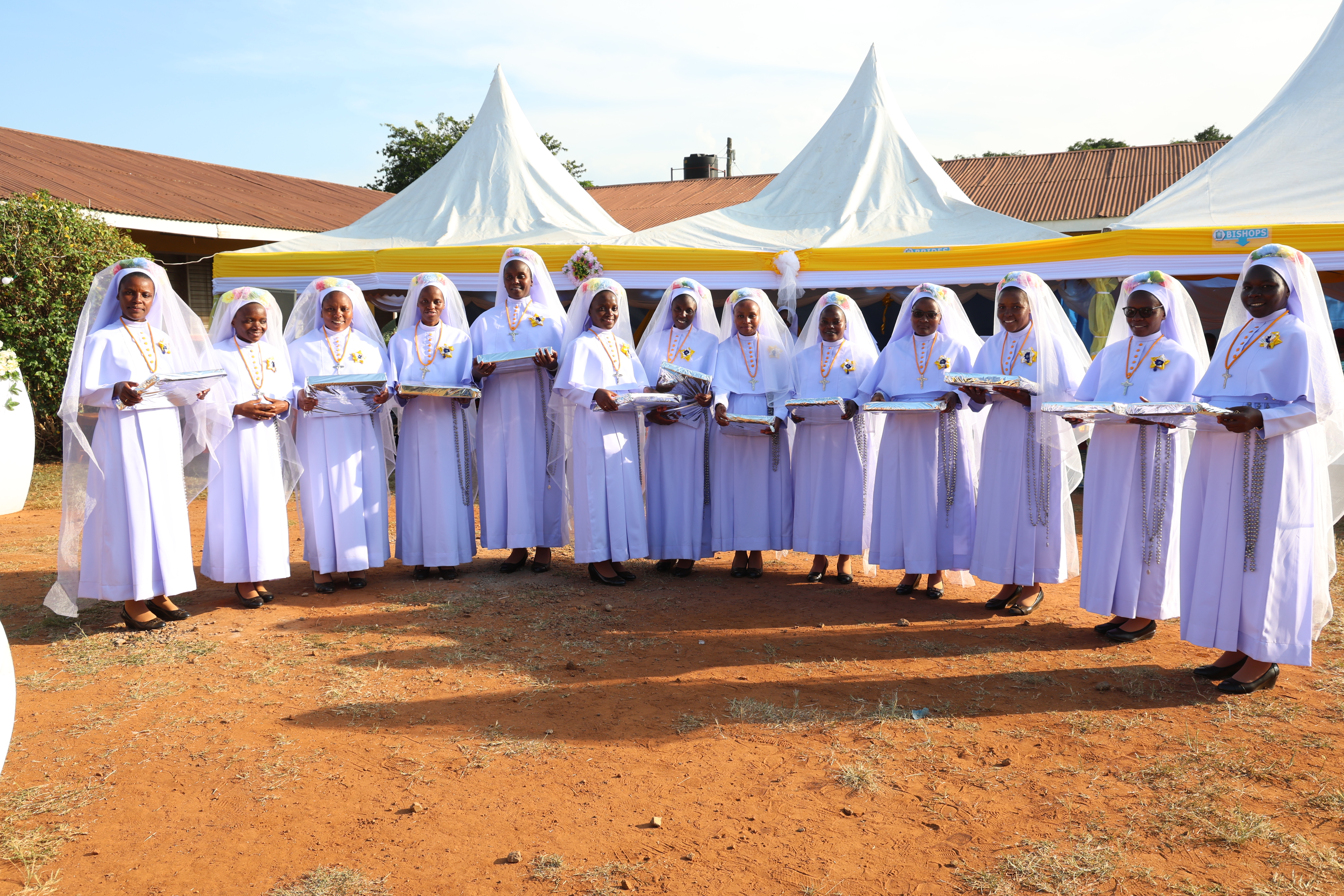 Happy Religious sisters in group photo after making Perpetual Profession