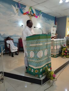 Rev. Fr. Joseph Sikwese sepaking at St. Andrew Kaggwa