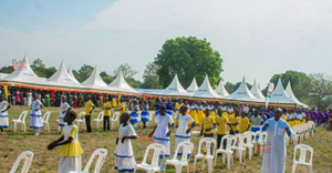 1-Pilgrims in the offertory procession during the Holy Mass at Omach pilgrimage site@0.3x