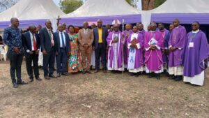 BISHOP KIBIRA WITH THE CLERGY AND INVITED GUEST SHORTLY AS THE LAUNCHING