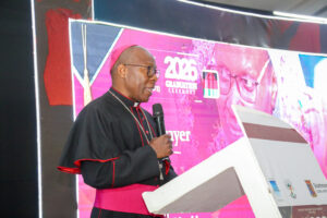 Bishop Vincent Mwakhwawa speaking during the graduation