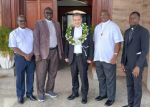 Group Photo of Monsignor Marco Ganci, Bishop Santo Loku Pio and the priests who received him